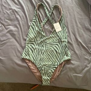 Brand new acacia with tags